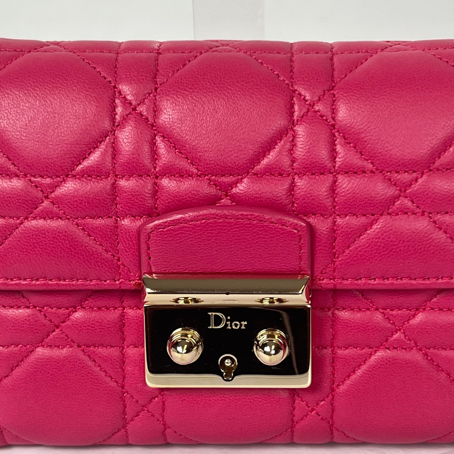 CHRISTIAN DIOR Portafoglio in pelle d'agnello Cannage fucsia