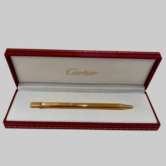 CARTIER Penna a sfera corpo in metallo oro motivo striato