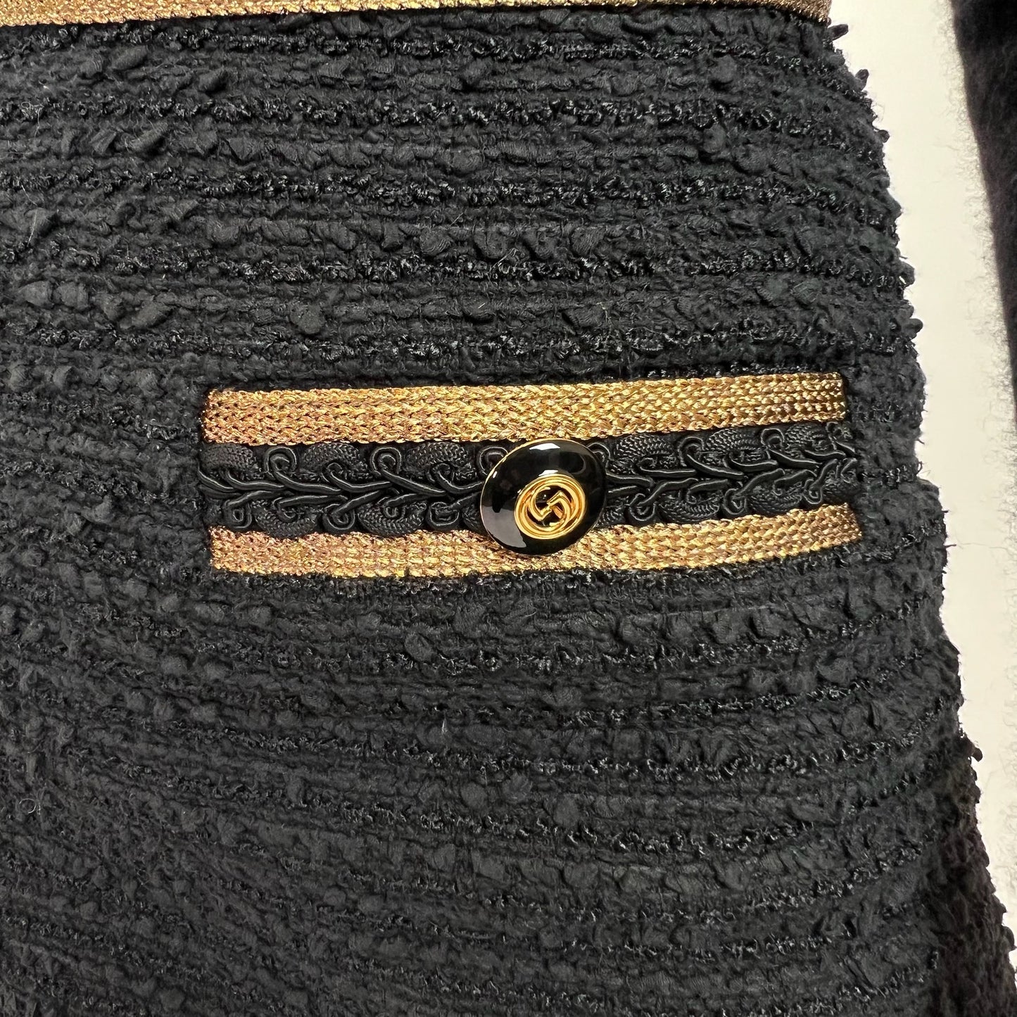 GUCCI Gonna bouclé nera con dettagli oro