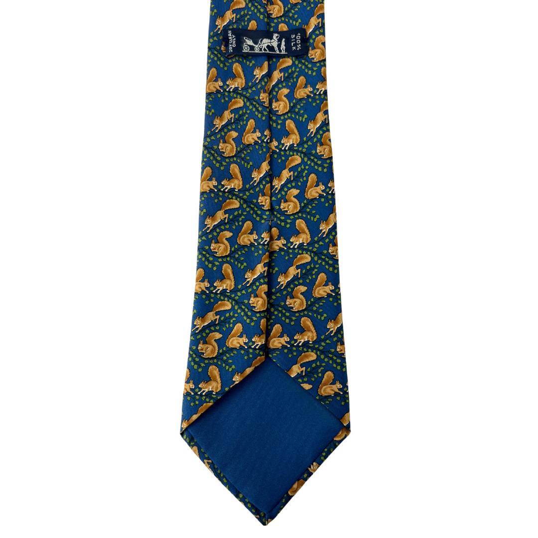 HERMES Cravatta seta blu con disegni scoiattoli