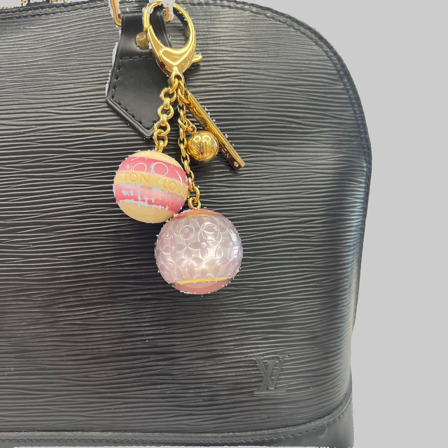 LOUIS VUITTON Charms per borsa con sfere rosa panna e lilla