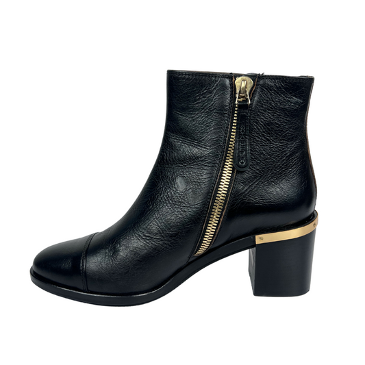 L'AUTRE CHOSE Stivaletto in pelle nera con dettagli oro