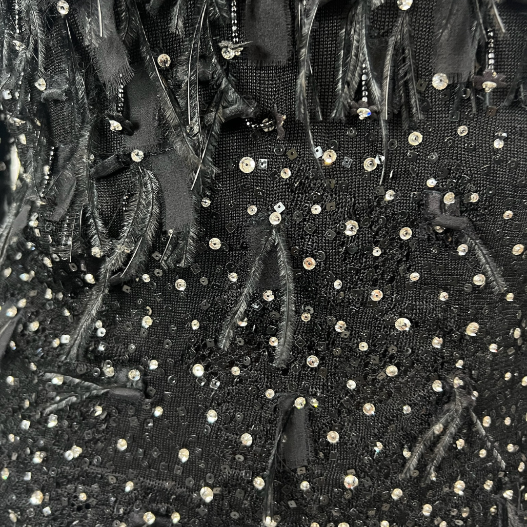 N.N. Casacca in maglia di seta nera con cristalli piume e paillettes