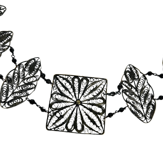 ROSANTICA MILANO Cintura metallica nera con catena di foglie