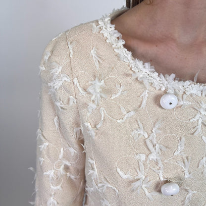MOSCHINO Soprabito panna con applicazioni in rilievo