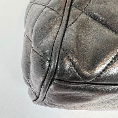 CHANEL Zaino matelassè in pelle d'agnello marrone