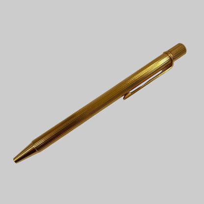 CARTIER Penna a sfera corpo in metallo oro motivo striato