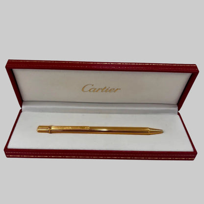 CARTIER Penna a sfera corpo in metallo oro motivo striato