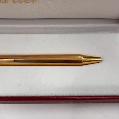 CARTIER Penna a sfera corpo in metallo oro motivo striato