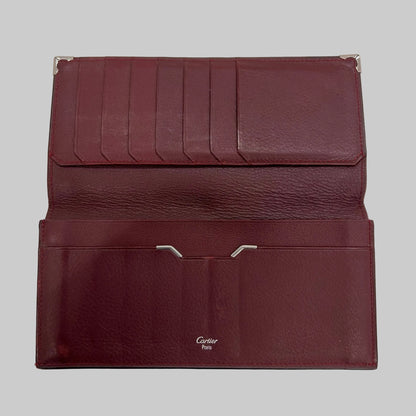 CARTIER Portadocumenti "Must de Cartier" pelle nera ed interno bordeaux 