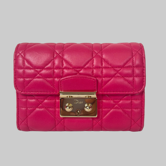 CHRISTIAN DIOR Portafoglio in pelle d'agnello Cannage fucsia