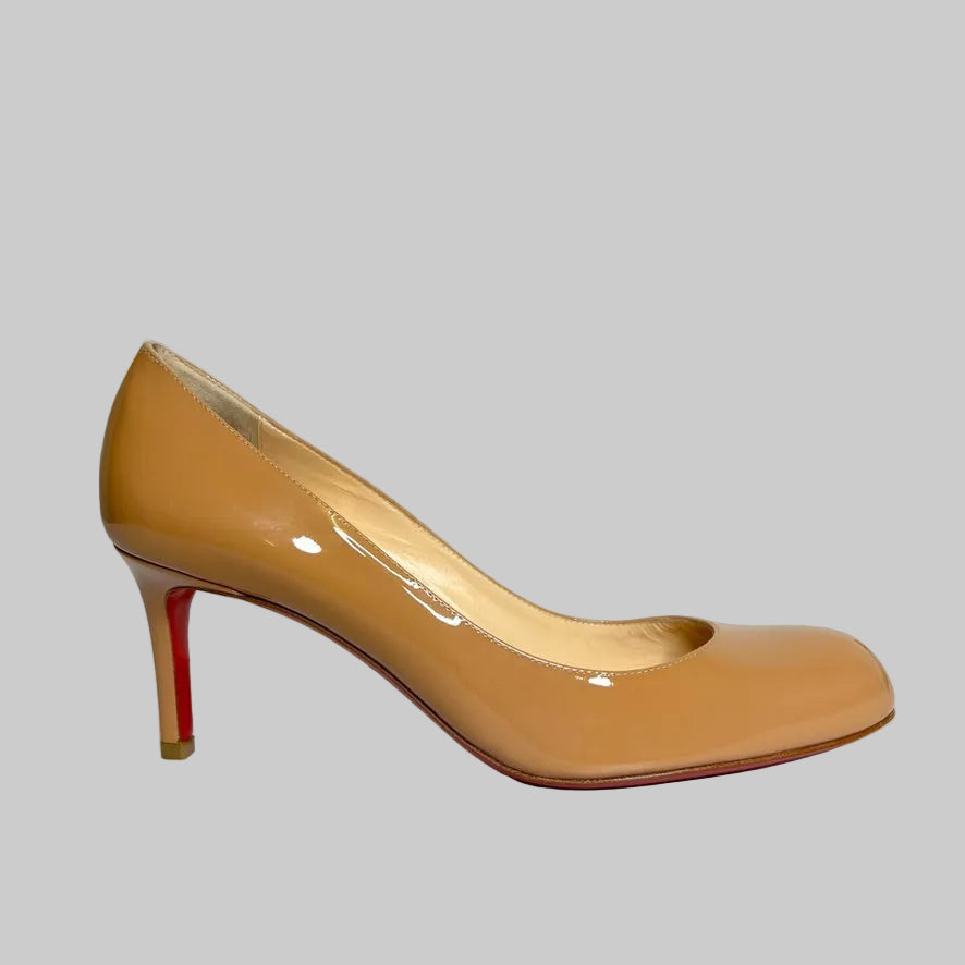 CHRISTIAN LOUBOUTIN Scarpe decolletè in vernice nude