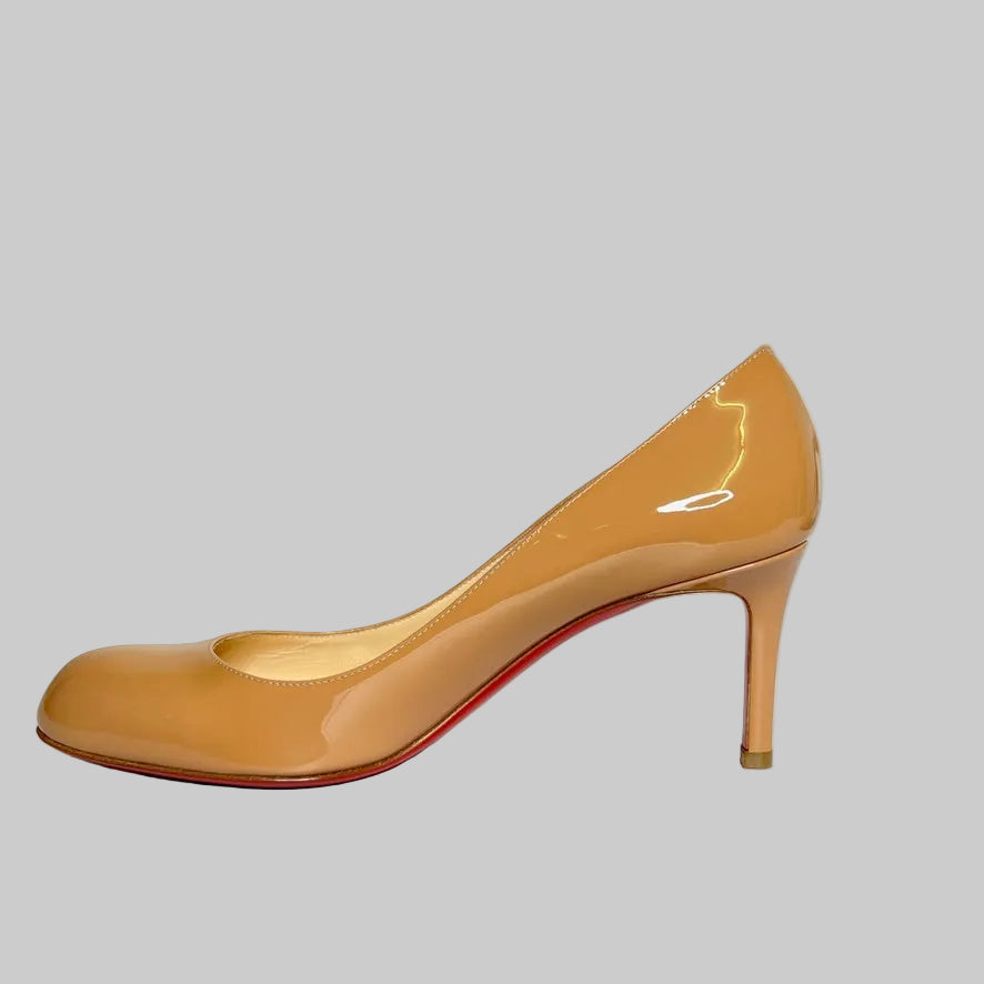 CHRISTIAN LOUBOUTIN Scarpe decolletè in vernice nude