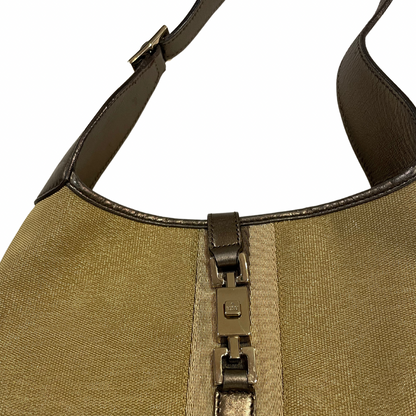 Borsa in tessuto oro e inserti in pelle color bronzo. Chiusura hdw oro 1 manica Jackie O’.