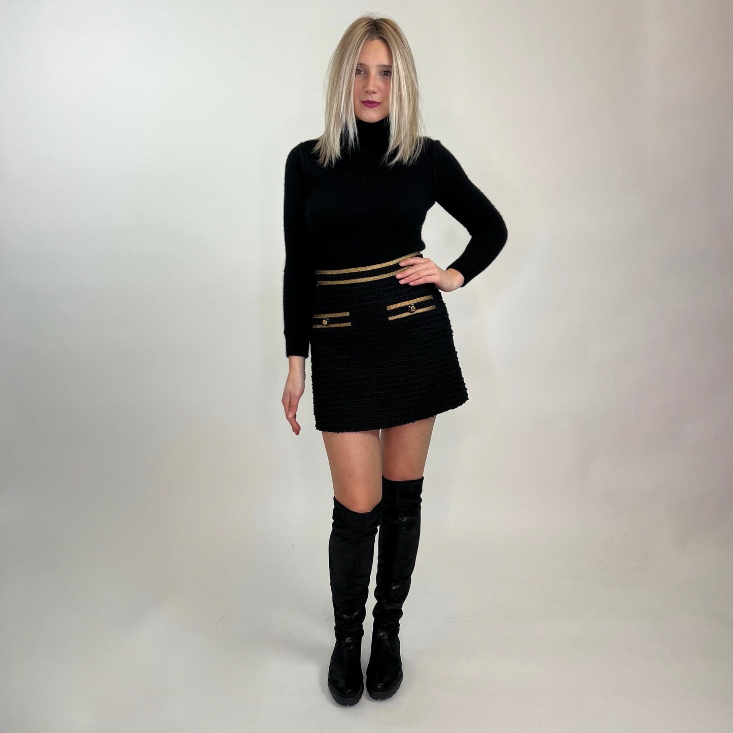 GUCCI Gonna bouclé nera con dettagli oro