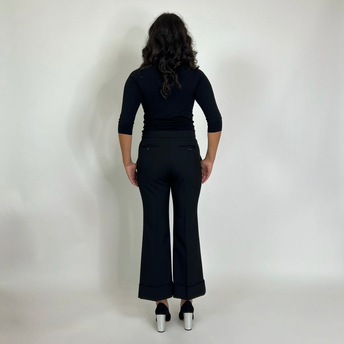 GUCCI Pantalone nero in lana con staffe su punto vita