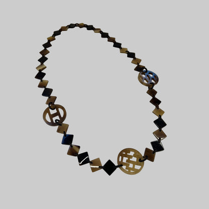 HERMES Collana in corno di bufalo nei toni del marrone 