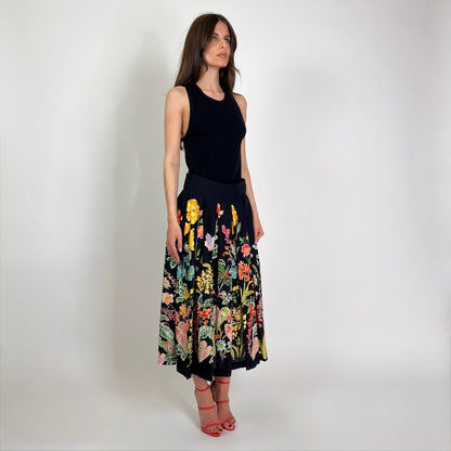 LAVI COUTURE Gonna nera a pieghe con fiori multicolori