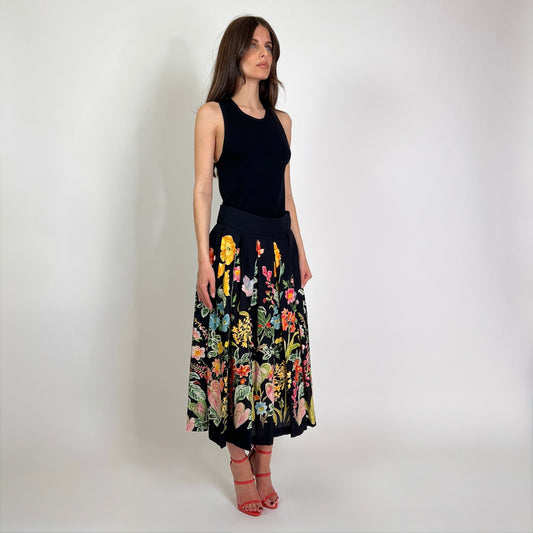 LAVI COUTURE Gonna nera a pieghe con fiori multicolori