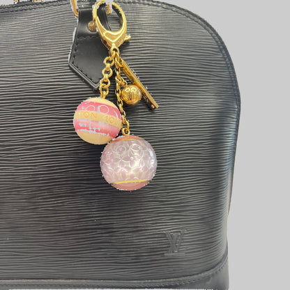 LOUIS VUITTON Charms per borsa con sfere rosa panna e lilla