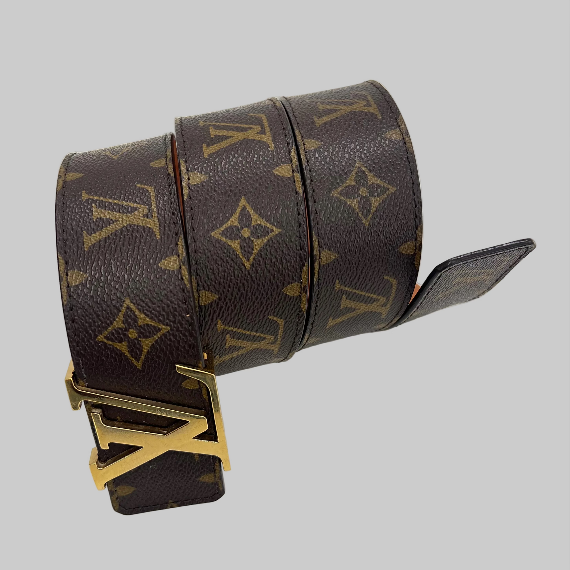 LOUIS VUITTON Cintura monogram con fibbia LV dorata