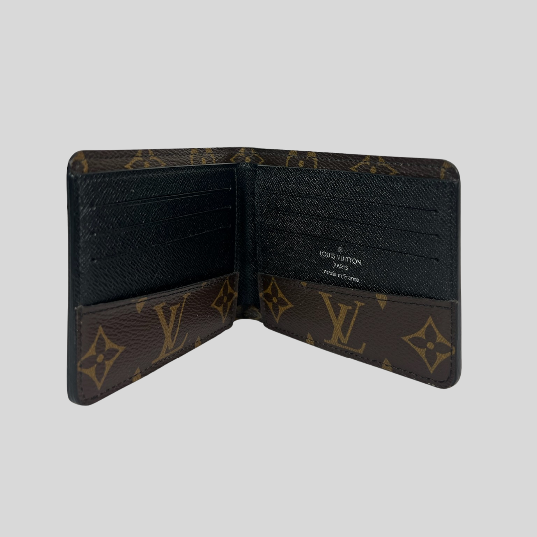 LOUIS VUITTON Portafoglio in monogram "Multiple Wallet Macassar"