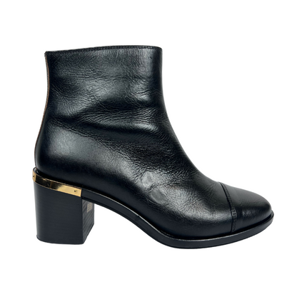 L'AUTRE CHOSE Stivaletto in pelle nera con dettagli oro 