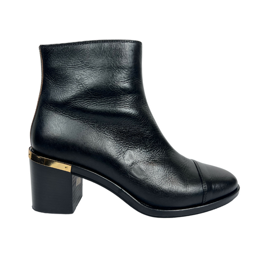 L'AUTRE CHOSE Stivaletto in pelle nera con dettagli oro 