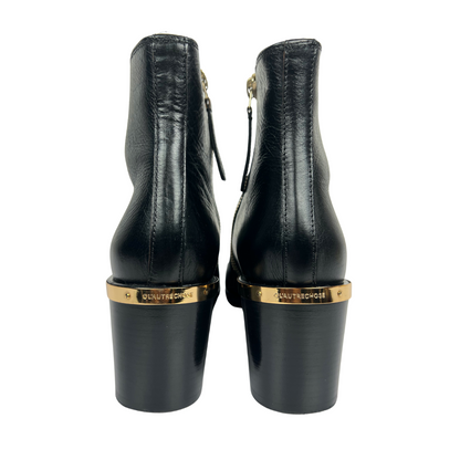 L'AUTRE CHOSE Stivaletto in pelle nera con dettagli oro 