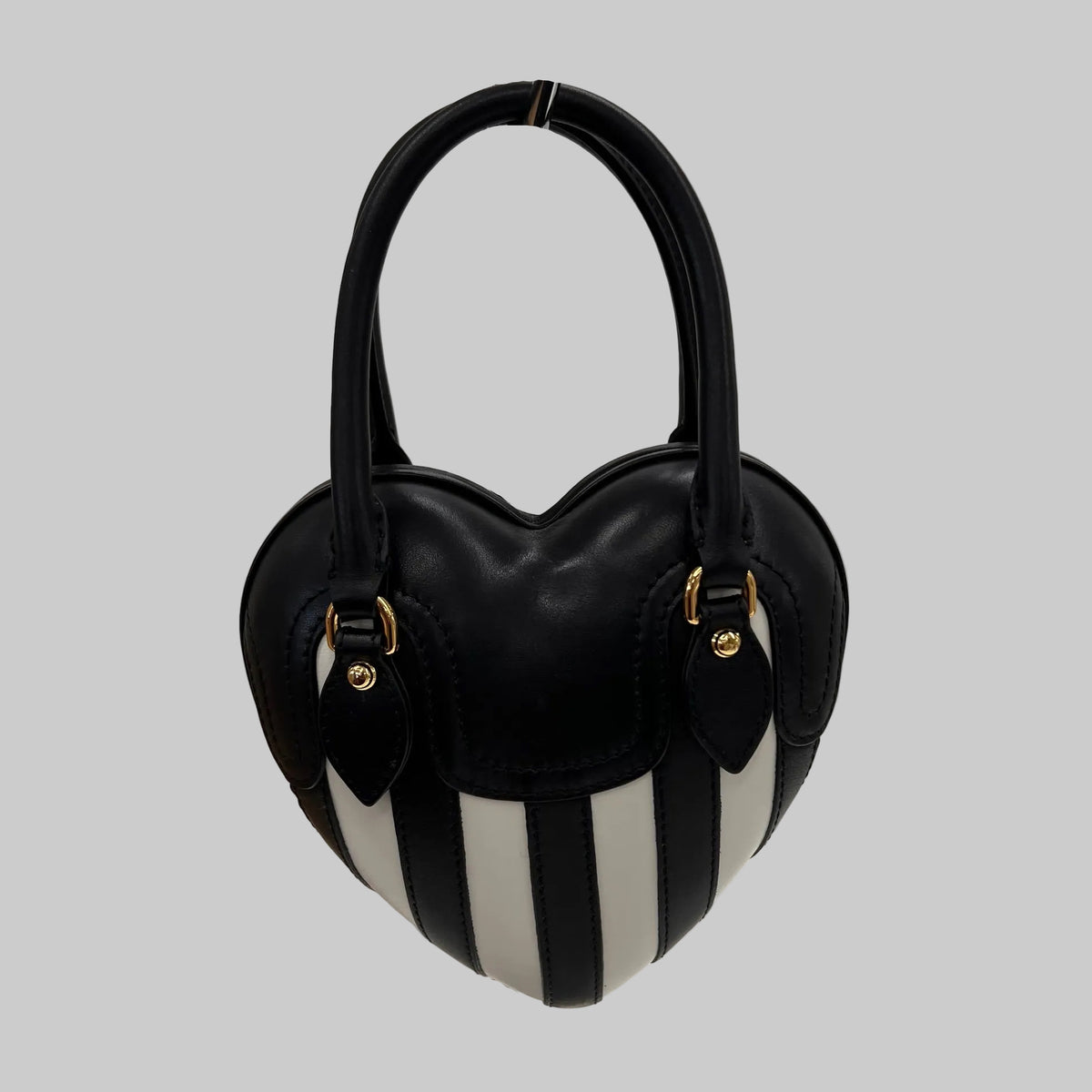 MOSCHINO COUTURE Borsa "Padlock Heart" a forma di cuore in pelle nera con righe bianche