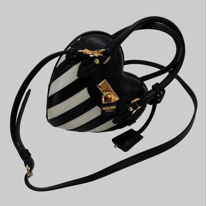 MOSCHINO COUTURE Borsa "Padlock Heart" a forma di cuore in pelle nera con righe bianche