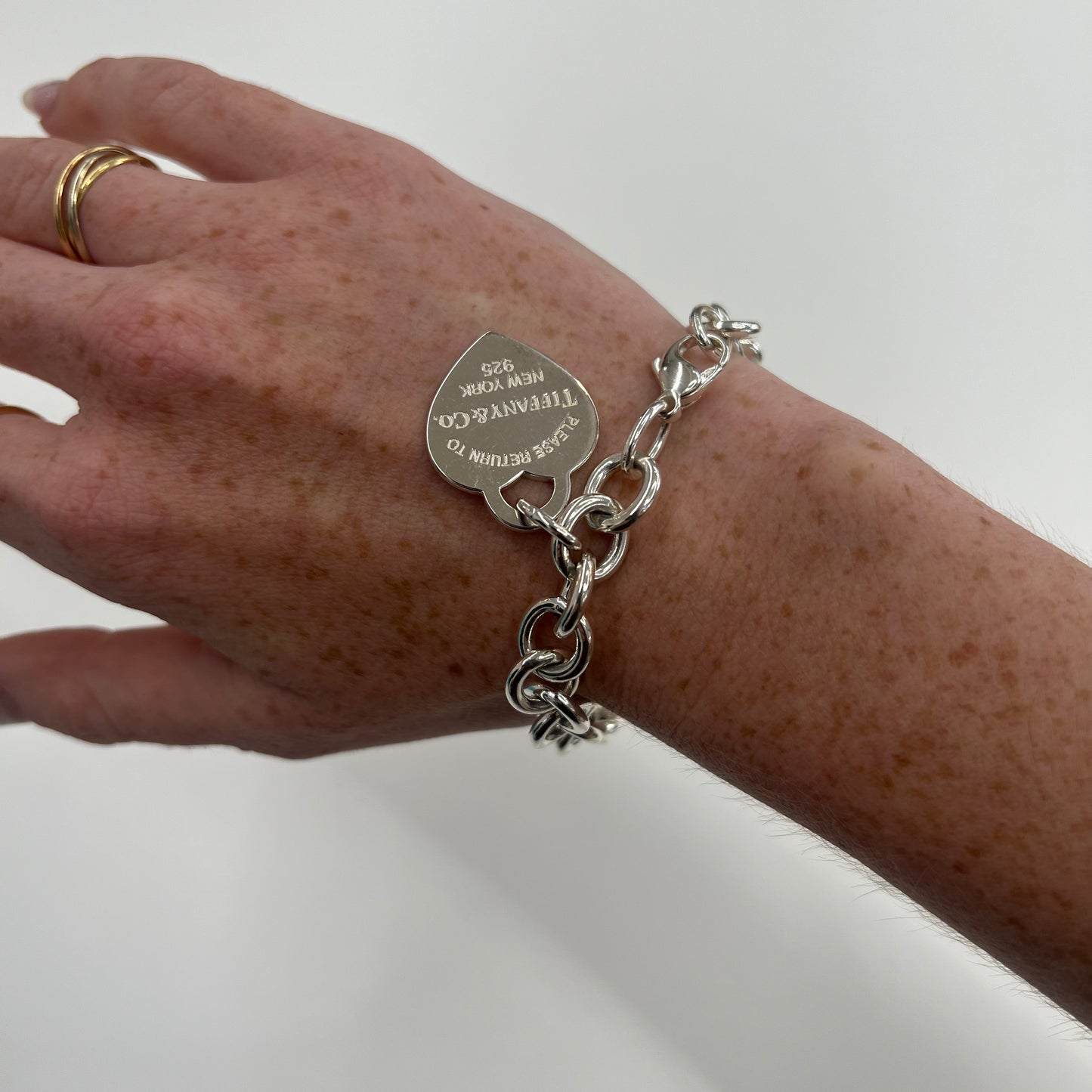 TIFFANY Bracciale "Heart Tag Charms" in argento 925 con charms cuore