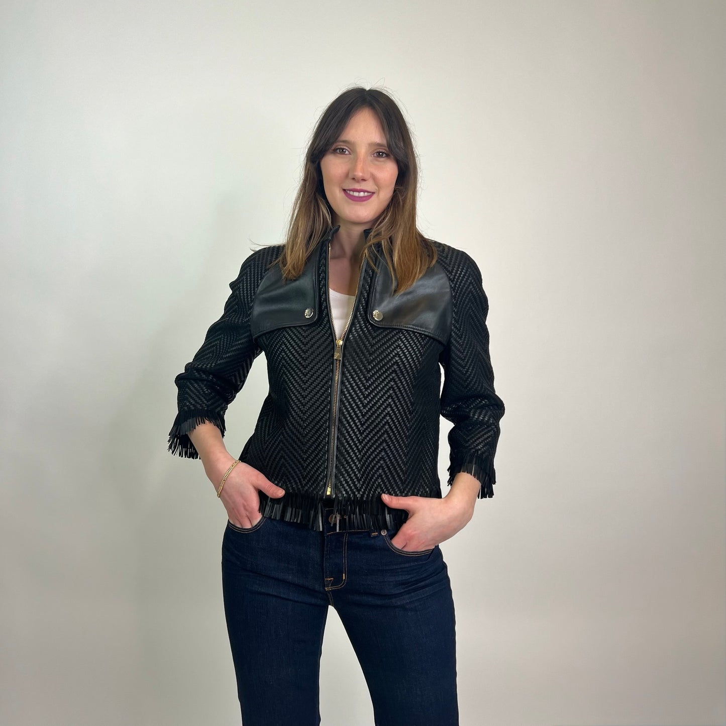 VERSACE COLLECTION Giacca in pelle nera intrecciata con frange